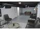 Finished basement with pool table, couch, and other seating creating a cozy entertainment space at 7144 Sandalwood Dr, Indianapolis, IN 46217