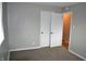 Bedroom featuring a closet with doors and natural light at 7144 Sandalwood Dr, Indianapolis, IN 46217