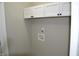 Laundry room featuring wall cabinets, utility connections, and neutral walls at 7144 Sandalwood Dr, Indianapolis, IN 46217