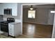 View from kitchen into living room, showing open layout at 7144 Sandalwood Dr, Indianapolis, IN 46217