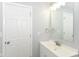 Clean bathroom features a modern sink and vanity at 8230 E 12Th St, Indianapolis, IN 46219