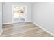 Bright living room with sliding doors leading to outdoor living at 8230 E 12Th St, Indianapolis, IN 46219