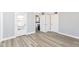 Spacious living area with modern flooring at 8230 E 12Th St, Indianapolis, IN 46219