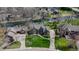 Aerial view showcasing a beautiful home with manicured lawns and waterfront access at 895 Baywood Ct, Columbus, IN 47201