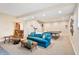 Finished basement with a cozy seating area, ping pong table, and ample space for recreation at 895 Baywood Ct, Columbus, IN 47201