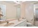 Well-lit bathroom with double sinks, vanity storage, and a large mirror at 895 Baywood Ct, Columbus, IN 47201