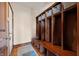 Functional mudroom features custom wooden lockers with ample storage and a small rug at 895 Baywood Ct, Columbus, IN 47201