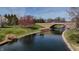 Scenic view of waterfront property with lush greenery and tranquil river setting at 895 Baywood Ct, Columbus, IN 47201