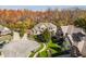 An aerial view of the home and neighborhood with beautiful fall foliage at 9643 N Box Elder Ct, McCordsville, IN 46055