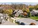 Aerial view of the home and neighborhood showcasing beautiful autumn foliage at 9643 N Box Elder Ct, McCordsville, IN 46055
