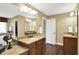 Bathroom featuring double vanity, granite countertops, and a bathtub at 9643 N Box Elder Ct, McCordsville, IN 46055