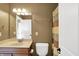 Bathroom featuring a single sink vanity, toilet, neutral wall color and a shower with patterned curtain at 9643 N Box Elder Ct, McCordsville, IN 46055