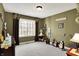 Bedroom featuring a large window and neutral carpeting at 9643 N Box Elder Ct, McCordsville, IN 46055