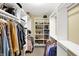 Walk-in closet with ample shelving, hanging rods, and storage space for clothes and shoes at 9643 N Box Elder Ct, McCordsville, IN 46055