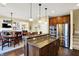 Stylish kitchen seamlessly connected to the dining area, featuring stainless steel appliances at 9643 N Box Elder Ct, McCordsville, IN 46055
