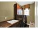 Laundry room featuring washer and dryer, with overhead cabinet at 9643 N Box Elder Ct, McCordsville, IN 46055