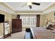 Spacious main bedroom with large window and neutral carpet at 9643 N Box Elder Ct, McCordsville, IN 46055