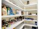 Pantry with ample shelving for storage and organization at 9643 N Box Elder Ct, McCordsville, IN 46055