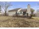 Backyard with a wooden deck and a chimney at 10441 Alexia Dr, Indianapolis, IN 46236