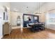 Cozy dining area with dark accent wall near the main entrance and kitchen at 10441 Alexia Dr, Indianapolis, IN 46236