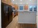 Spacious kitchen with stainless steel appliances, hardwood floors, and a center island at 11134 Westoves Dr, Noblesville, IN 46060