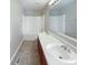 Clean bathroom featuring dual sinks, a large mirror, and shower-tub combination at 1155 Dark Star Ct, Whiteland, IN 46184