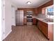 Well-equipped kitchen featuring stainless steel appliances and dark wood cabinetry at 1155 Dark Star Ct, Whiteland, IN 46184