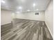 Spacious basement featuring luxury vinyl plank flooring and recessed lighting at 12036 Weathered Edge Dr, Fishers, IN 46037