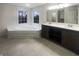 Bathroom features a soaking tub, double sink vanity, tile floors and neutral paint at 12036 Weathered Edge Dr, Fishers, IN 46037