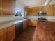 Bright kitchen featuring stainless steel appliances, wood cabinets, and an island at 12036 Weathered Edge Dr, Fishers, IN 46037
