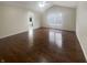 Main bedroom featuring hardwood floors, natural light, and an en-suite bathroom at 12036 Weathered Edge Dr, Fishers, IN 46037