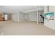 Finished basement space with a built in television, and room for exercise equipment at 13133 Brooks Landing Pl, Carmel, IN 46033