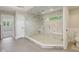 Bathroom featuring a glass shower, neutral colors, and tiled floors at 13133 Brooks Landing Pl, Carmel, IN 46033