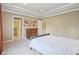 Spacious bedroom with access to an ensuite bathroom and walk-in closet, promoting a luxurious and private retreat at 13133 Brooks Landing Pl, Carmel, IN 46033