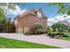 Well-maintained brick home featuring an attached garage and professionally landscaped surroundings at 13133 Brooks Landing Pl, Carmel, IN 46033