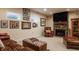 Finished basement with a fireplace and comfortable seating arrangements at 1320 N New Jersey St, Indianapolis, IN 46202