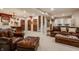 Finished basement featuring plush leather furniture, wooden accents, and a Coca Cola motif at 1320 N New Jersey St, Indianapolis, IN 46202