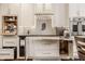 Gourmet kitchen with custom cabinetry, modern appliances and pull-out table extension at 1320 N New Jersey St, Indianapolis, IN 46202