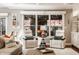 Relaxing living room with a cozy fireplace, bright windows, and comfortable seating at 1320 N New Jersey St, Indianapolis, IN 46202
