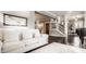 Bright living room featuring a cozy white sofa and dark wood floors offers a welcoming space at 1320 N New Jersey St, Indianapolis, IN 46202