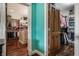 Open doorway leads into a spacious walk-in closet with custom shelving and ample storage at 1320 N New Jersey St, Indianapolis, IN 46202
