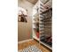 Custom wine cellar with built in shelving and wooden flooring at 1320 N New Jersey St, Indianapolis, IN 46202