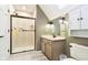 A bathroom featuring a walk-in shower, vanity with a sink, and a mirror at 13661 Smokey Ridge Pl, Carmel, IN 46033