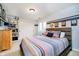 This bedroom includes a closet and an area to put sports memorabilia on display at 13661 Smokey Ridge Pl, Carmel, IN 46033
