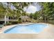 Spacious backyard featuring a large in-ground pool, lounge chairs, and dining area, perfect for entertaining at 13661 Smokey Ridge Pl, Carmel, IN 46033