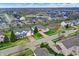 Aerial shot showcasing a neighborhood with well-maintained homes and green spaces at 14242 Brandt Ln, Carmel, IN 46074