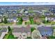Beautiful aerial view of a suburban neighborhood featuring well-maintained homes and green lawns at 14242 Brandt Ln, Carmel, IN 46074