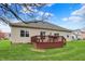 The backyard features a spacious deck ideal for outdoor entertaining and relaxation at 14242 Brandt Ln, Carmel, IN 46074