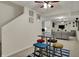 Finished basement area with bar seating and a comfortable living area with plush seating at 14242 Brandt Ln, Carmel, IN 46074