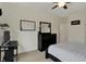 Bedroom with dark wood furniture, light carpet, and neutral walls providing a relaxing atmosphere at 14242 Brandt Ln, Carmel, IN 46074